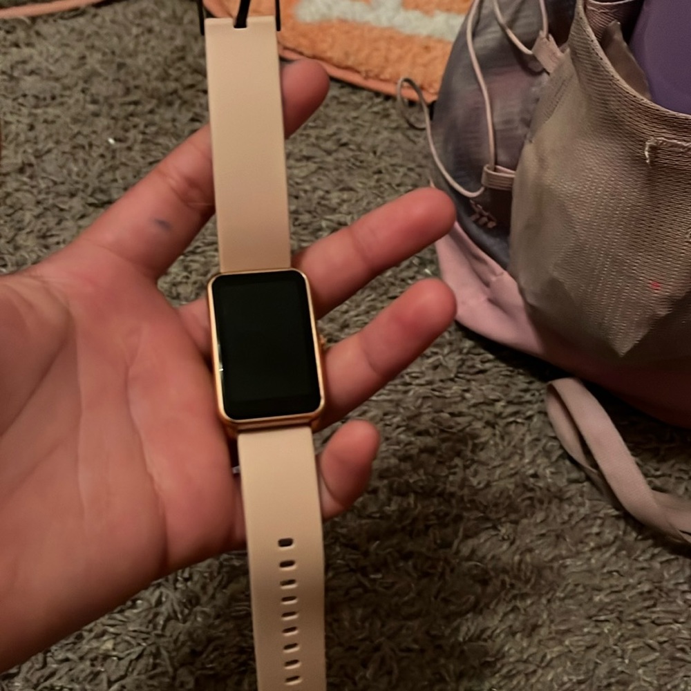 Rose gold fit bit (CHARGER NOT INCLUDED)